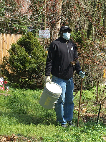 image of gardener with mask